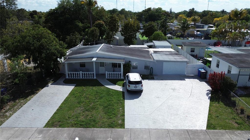 Photo of 126 Miami Gardens Road, West Park, FL 33023 (MLS # TB8491387)