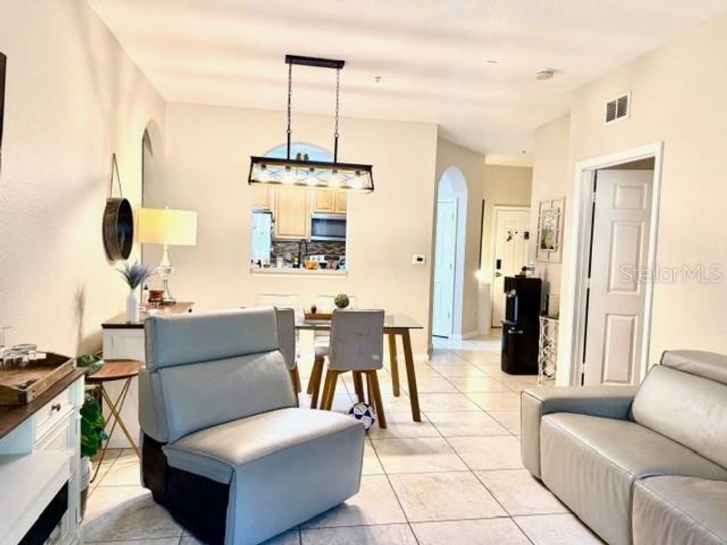 Photo of 6451 Old Park Lane #102, Orlando, FL 32835 (MLS # O6398451)