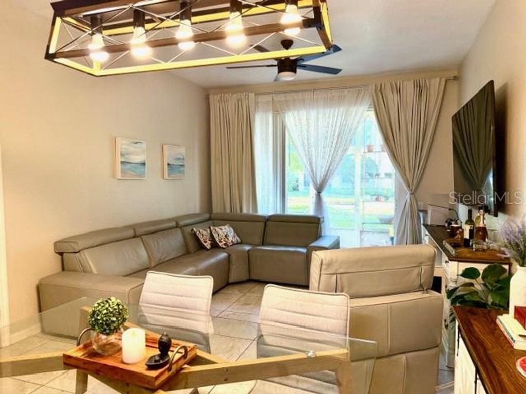 Photo of 6451 Old Park Lane #102, Orlando, FL 32835 (MLS # O6398451)