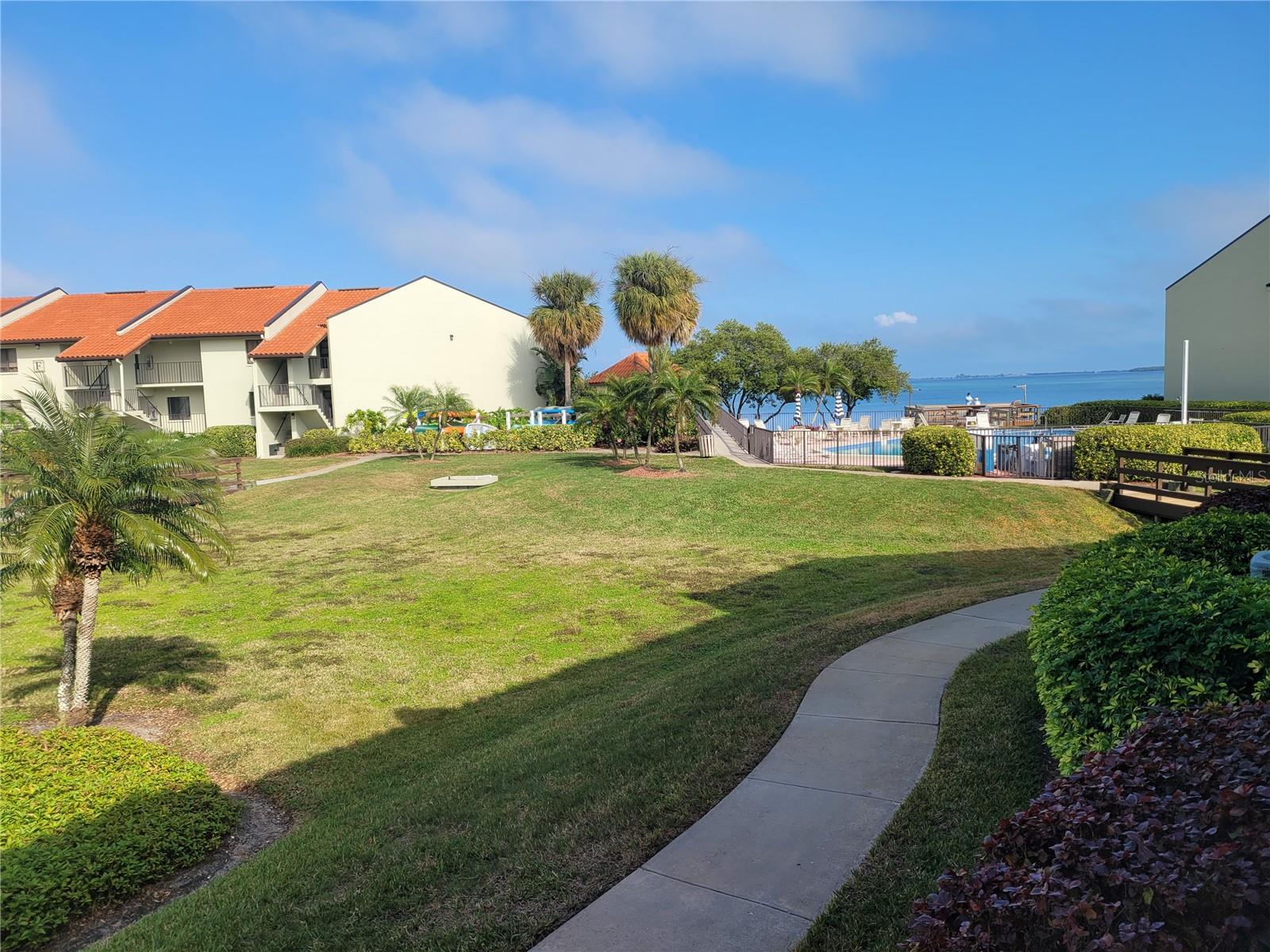 LONG-TERM LEASE ONLY – Located in the beautiful waterfront community of Wander Residences Of Tierra Verde, this charming first-floor unit offers stunning garden, pool, and partial water views.
Rent Includes: Water, sewer, garbage, high-speed cable, and internet!
Features:
• Turn-key furnished with Cuban tile throughout
• Leather furniture in the living room
• Queen bed in the master bedroom
• Beautifully remodeled bathroom with a spacious walk-in shower
• Fully stocked kitchen
Community Amenities:
• Heated pool & Hot tub
• Tennis & pickleball courts
• Observation pier with gas BBQ grill
• Boat dock with electricity & running water for fishing
• Clubhouse with widescreen TV, free Wi-Fi, pool table & exercise room
• Secure-access laundry facility (change available in the clubhouse)
• Kayak, canoe & bike storage (registration & fee required)
Prime Location:
Conveniently situated near I-275, offering quick access to Tampa, Clearwater, Sarasota, and top-rated beaches. The area provides a variety of activities for all ages!