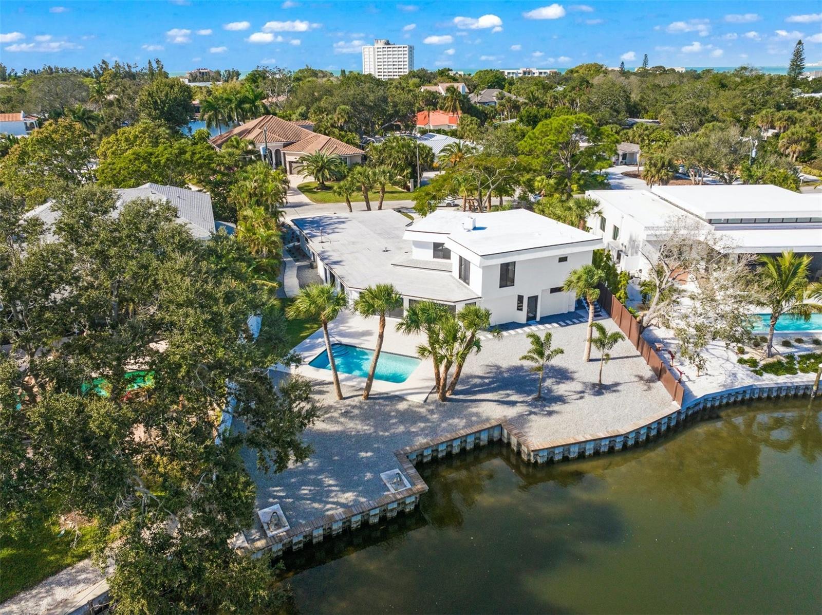 Fantastic lot to build your dream house on ~ .32 of an ACRE and on a great canal-front lot (100x154x81). CONSTRUCTION FINACING AVAILABLE FOR QUALIFIED BUYER! This home has had significant storm damage and is now being sold as a tear down!! Situated in one of Sarasota’s premier canal locations, this property is located a quick bike ride to the beautiful sands of Siesta Key beach. Siesta Key Village is known for its endless shopping and dining venues, and just a bridge away from the mainland and all that Sarasota has to offer. With no HOA or CDD, and a large waterfront lot, this home is the perfect vacation or year round destination. Don’t miss this opportunity to own a piece of paradise. This home is being sold "as-is" and will require a cash transaction.