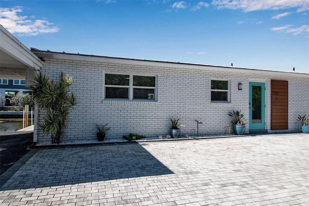 Photo of 713 Saint Judes Drive S #1, Longboat Key, FL 34228 (MLS # TB8459956)