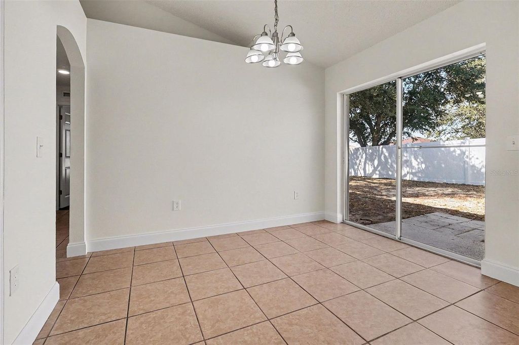 Photo of 715 Lobelia Drive, Davenport, FL 33837 (MLS # O6378877)