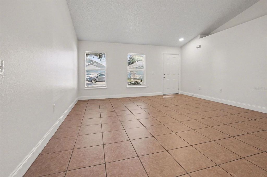 Photo of 715 Lobelia Drive, Davenport, FL 33837 (MLS # O6378877)