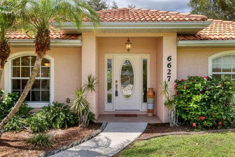 Photo of 6627 David Boulevard, Port Charlotte, FL 33981 (MLS # D6143640)
