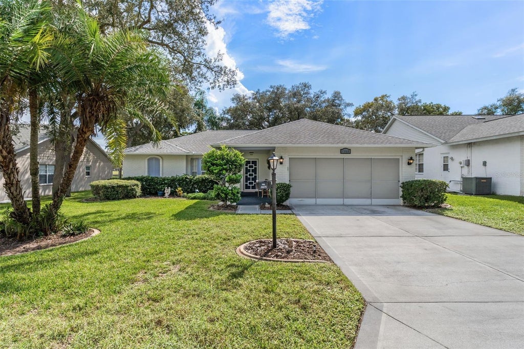 Photo of 7368 Sugarbush Drive, Spring Hill, FL 34606 (MLS # W7890424)