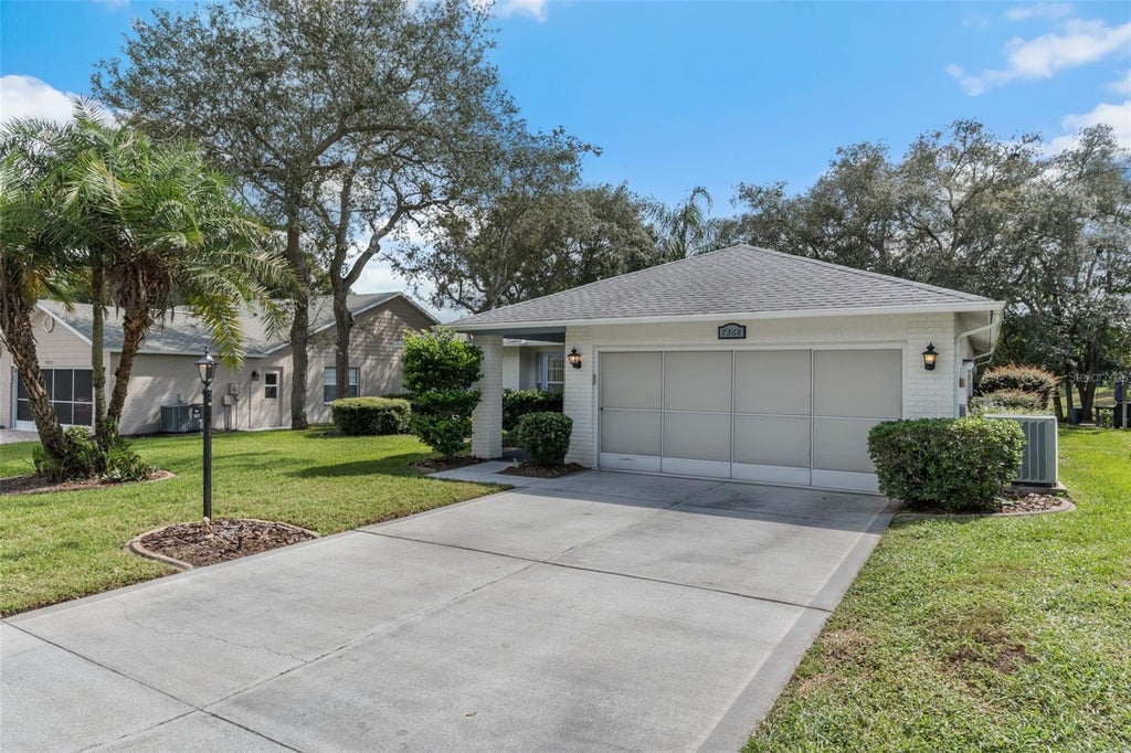 Photo of 7368 Sugarbush Drive, Spring Hill, FL 34606 (MLS # W7890424)