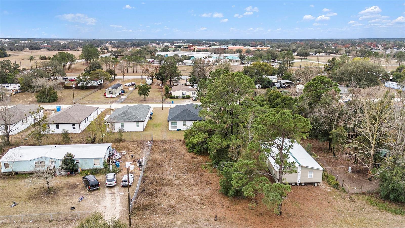 Discover the perfect opportunity to build your dream home or investment property on this 0.17-acre vacant lot, nestled in the tranquil community of Tangerine Estates in Brooksville, Florida. Experience the charm of small-town living while being just a short drive from Tampa, nature trails, and local shops. This spacious lot is perfect for designing your custom home, with ample room for outdoor living or a garden. Conveniently located just minutes from shopping, dining, schools, and the Suncoast Parkway, you'll enjoy easy access to Tampa and the airport in under 45 minutes. Best of all, there are no HOA or CDD fees to worry about. Don’t miss your chance! Schedule your showing today and start planning your future in sunny Florida!