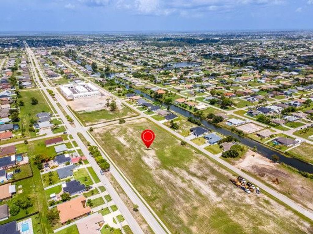 Photo of 845 Trafalgar Parkway, Cape Coral, FL 33991 (MLS # A4656494)