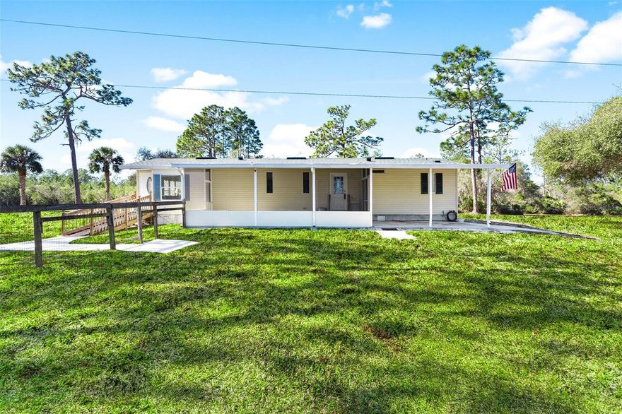 COUNTRY LIVING at its BEST! SUPER CLEAN 1992, 1483 SF, 2/2, doublewide. New roof in 2023. Setting on 9.25 acres, partially cleared, fenced, and livestock ready. Property also has a 42' x 50' x 12' metal barn w/10' x 12' door with a concrete floor. Attached to barn is a 7' x 39' x 7' metal shipping container, used as a workshop. Full house generator with buried LP tank. 

If you're looking to get out of town, have room to grow and don't have time to do the work, This is a must see property!

There is also another 6.82 acre parcel of land next door, adjacent with 2 points connecting, that is available to purchase.