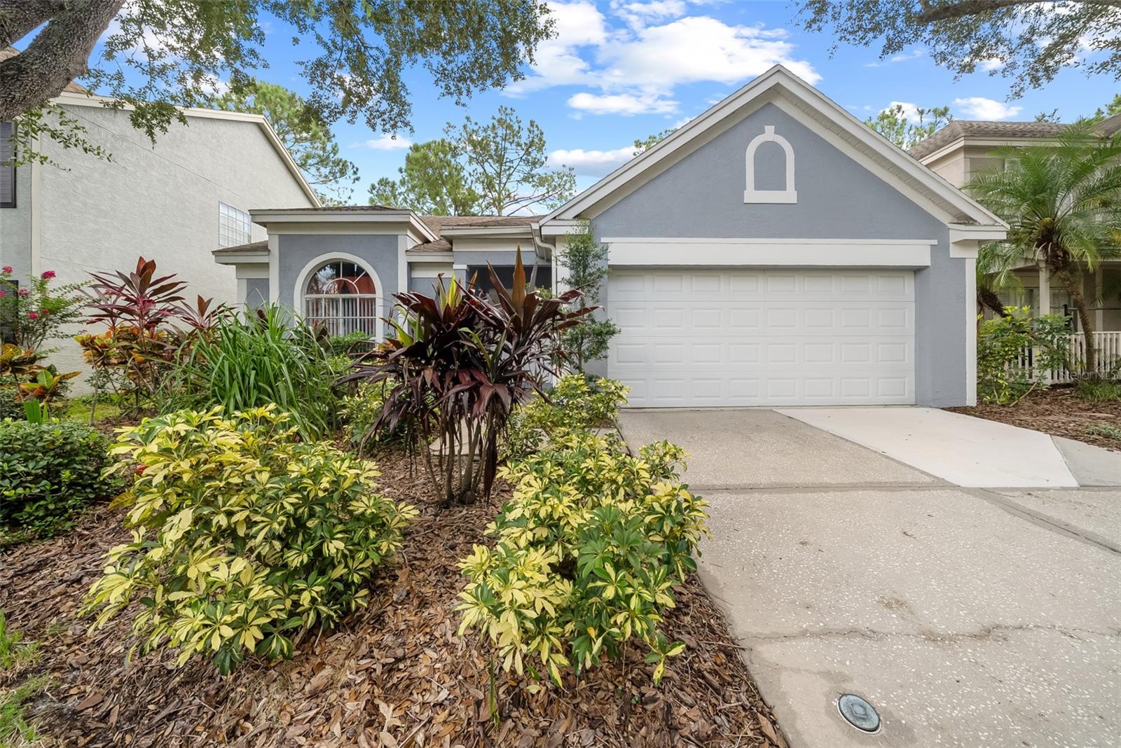 A peaceful lake view, a walkable neighborhood, and a home that’s been thoughtfully maintained—this one brings it all together.
Located in the gated Hunters Green community, this 3-bedroom, 2-bath home offers an open floor plan and serene lake views with no backyard neighbors. Inside, you'll find recent updates including a 1-year-old AC and thermostat, 2025-installed water heater, and a newer water softener and garbage disposal. The roof is approximately six years old, offering peace of mind for years to come.
Step outside to professionally landscaped grounds with freshly trimmed trees and a spacious backyard that opens to the water—perfect for morning coffee or evening unwinding. The 2-car garage provides ample storage, and the home’s location makes daily life easy: just a short walk to the neighborhood park, elementary school, and community amenities.