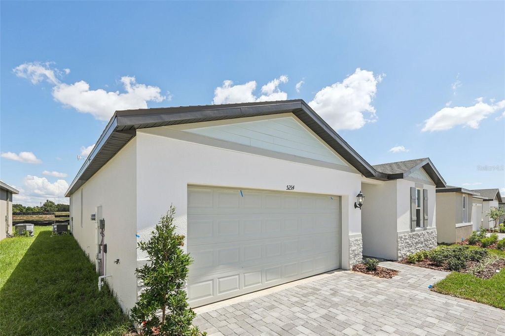 Photo of 5214 Green Belt Drive, Haines City, FL 33844 (MLS # O6336173)