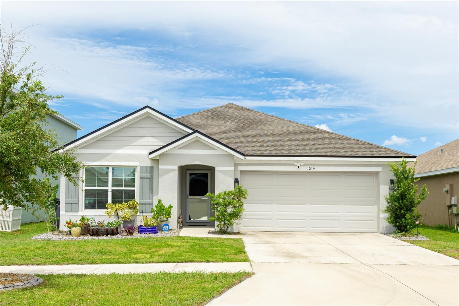 This home truly has it all with a brand new roof installed in August 2025 and leased solar panels with battery backup for just $123/month, giving the current owners a zero electric bill. Offering nearly 1,700 sq ft of living space with 3 bedrooms and 2 bathrooms, this Brookside Estates home blends efficiency, style, and comfort. The open-concept floor plan features a spacious kitchen with granite countertops, stainless steel appliances, a large pantry, and a breakfast bar island overlooking the light-filled dining and family rooms. The private primary suite includes a walk-in closet and dual vanity bath, while two additional bedrooms provide flexibility for guests, family, or a home office. Additional upgrades include plantation shutters, hurricane shutters, a whole-house water softener, reverse osmosis system in the kitchen, and a full-yard irrigation system not typically found in this community. Step outside to enjoy Florida living at its best with an extended screened lanai and fully fenced backyard complete with a storage shed, ideal for entertaining, gardening, or relaxing in privacy. Brookside Estates offers excellent amenities including a pool, clubhouse, playground, basketball court, dog park, and walking trails around peaceful ponds. The convenient Ruskin location places you near waterfront dining, marinas, shopping, and daily conveniences, with easy access to I-75 for quick commutes to Tampa, St. Pete, or Sarasota. **THIS PROPERTY QUALIFIES FOR A 1% LENDER INCENTIVE IF USING PREFERRED LENDER. INQUIRE FOR MORE DETAILS.**
