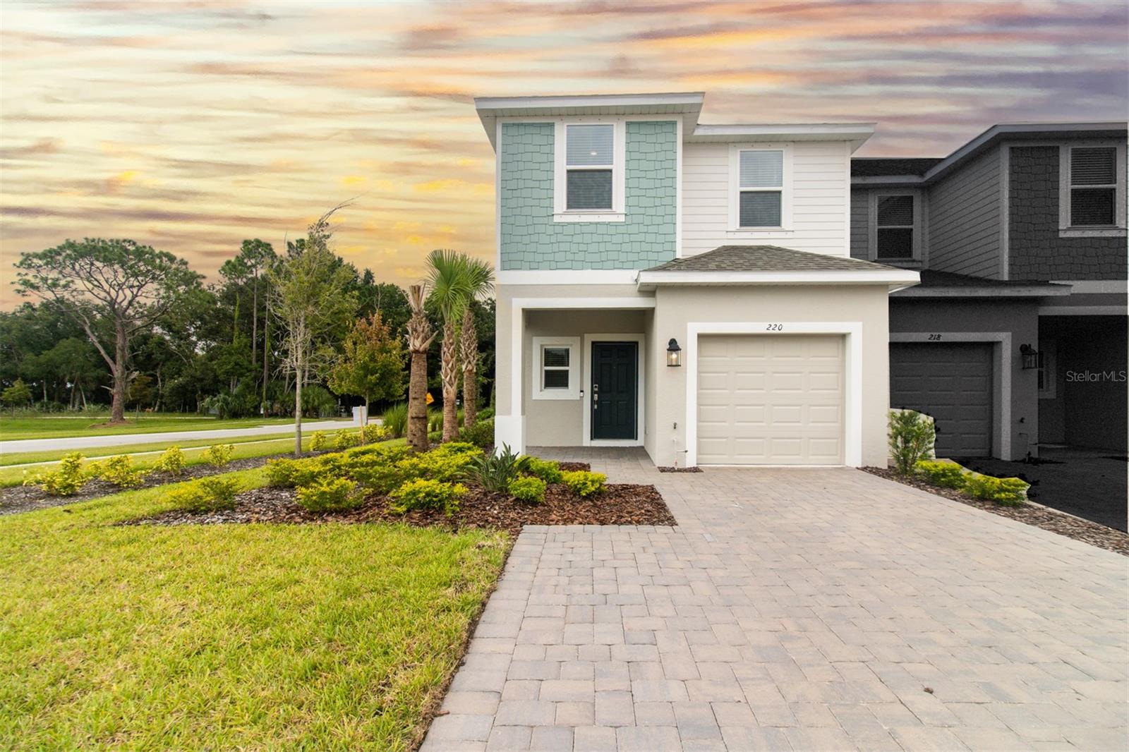 Enjoy coastal living with Peace of Mind in Edgewater’s newest waterfront community built by Taylor Morrison. Riverfront Townhomes is located on the Intracoastal Waterway perfectly situated between Oak Hill and New Smyrna Beach. The community features an observation deck on the river to enjoy peaceful sunrises while watching manatees, dolphins, and other coastal wildlife at play. Other amenities include two fountained ponds with walking docks, a dog park with agility obstacle courses, and a National Wildlife Federation-certified butterfly garden. This spacious 3 bedroom 2 and a half bath end unit townhome features a spacious open floorpan, designer kitchen with white shaker cabinets, sparkling white quartz countertops throughout and an extended kitchen island. All carpeting has been replaced with luxury vinyl plank flooring and all windows feature blinds and hurricane shutters for convenience. Tastefully landscaped and an adorable front porch, as well as a pavered driveway give this Craftsman styled home the perfect charm and curb appeal! Washer and dryer are included. This townhome is turnkey and ready, perfect for first time home buyers, snowbirds looking for a winter nest, or an investor looking for another great property to add to their portfolio. Schedule your showing today and see what Florida living is all about!