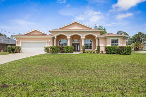 Photo of 19 Ehrling Lane, Palm Coast, FL 32164 (MLS # FC309170)