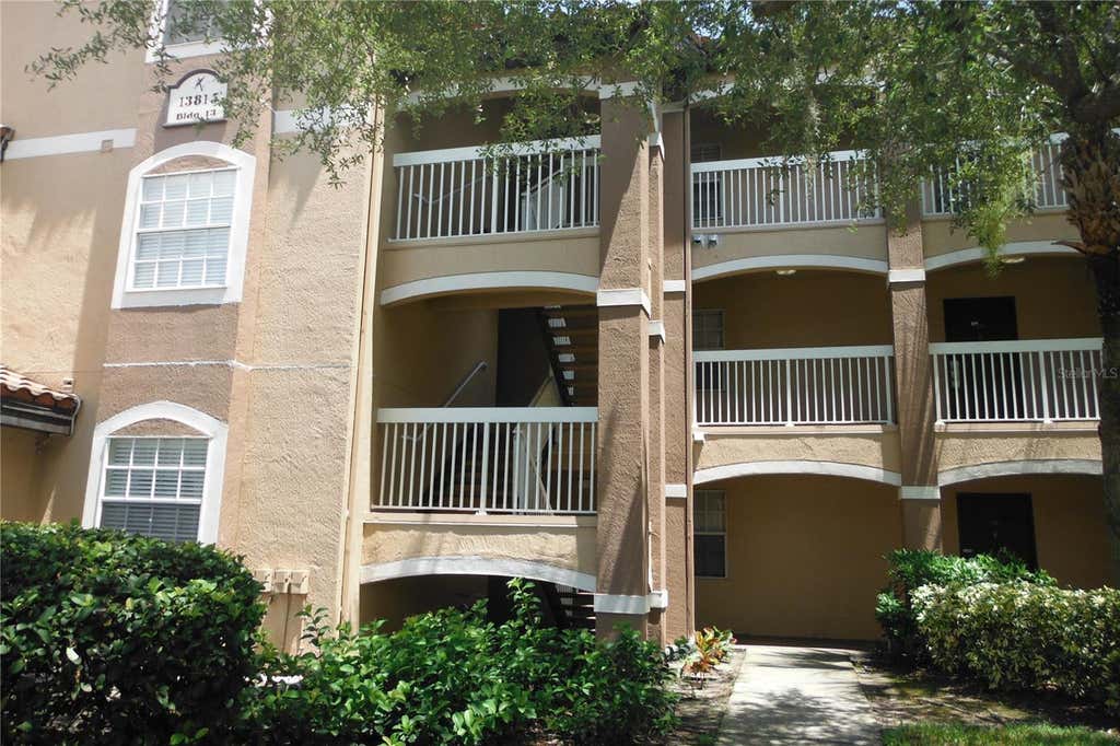 Photo of 13815 Fairway Island Drive #1313, Orlando, FL 32837 (MLS # O6435613)