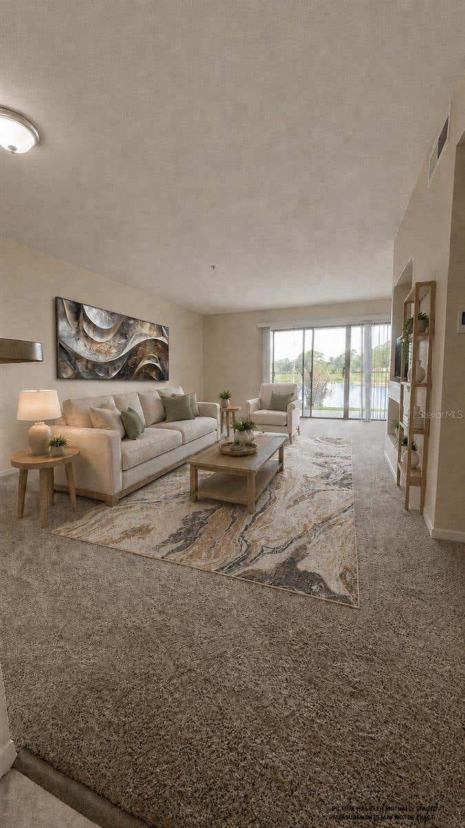 Photo of 13815 Fairway Island Drive #1313, Orlando, FL 32837 (MLS # O6435613)
