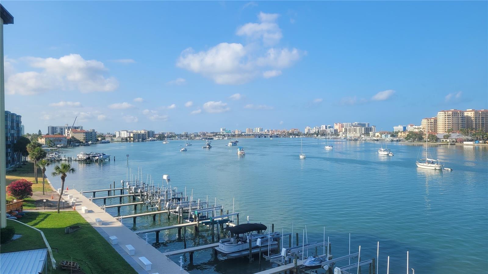 Looking for the absolute BEST in condo Living? This tranquil 3 bedroom, 2 bath condo is located in the Diamond Isle Condo Community. The condo offers mesmerizing water views overlooking the Clearwater Harbor, Intracoastal Waterway and stunning sunsets over Clearwater Beach. The spacious 1650 sq foot condo offers a large living area with built-in shelving over a decorative fireplace, galley kitchen with built-in bar and dining area all with gorgeous water views to the South. The primary bedroom has an en-suite bathroom, walk-in closet and South water views. Enjoy All the Amenities such as the gym with a sauna, billiard room, clubroom, shuffleboard and inside bike storage. Outside activities include tennis courts, waterfront heated pool, Tiki Hut with outdoor grills and a community dock. Located in the HIGHLY DESIRABLE area of Island Estates in Clearwater Beach there is plenty of shopping, restaurants and a short drive to all the action Clearwater Beach offers. If you are looking for an active, waterfront lifestyle with beach vibes this is it. Schedule your tour today