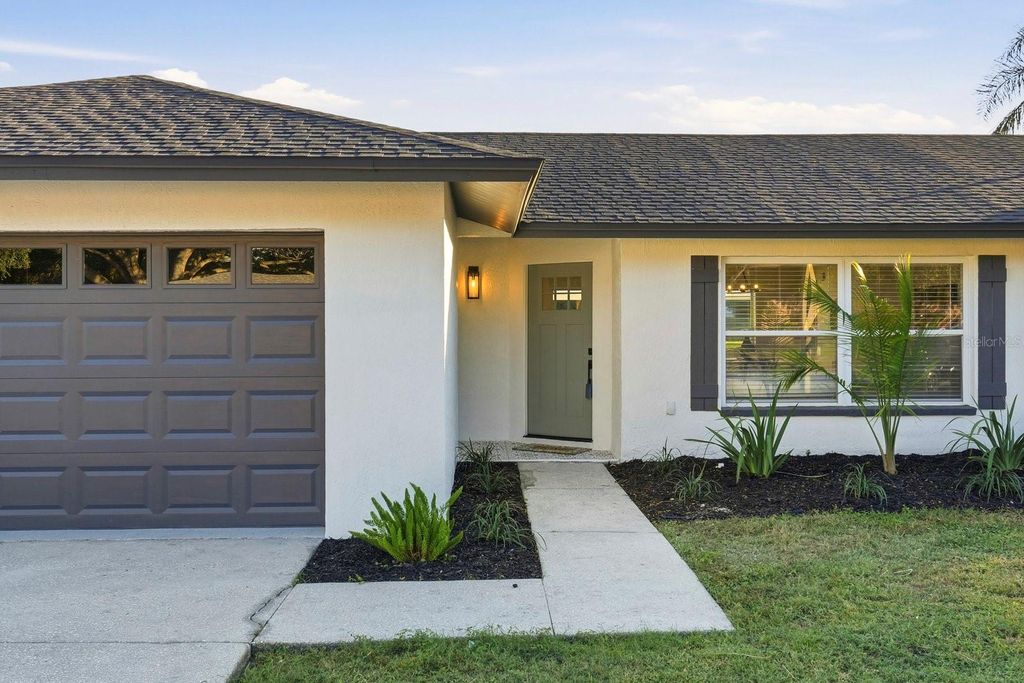 Photo of 389 Arbor Drive W, Palm Harbor, FL 34683 (MLS # TB8447637)