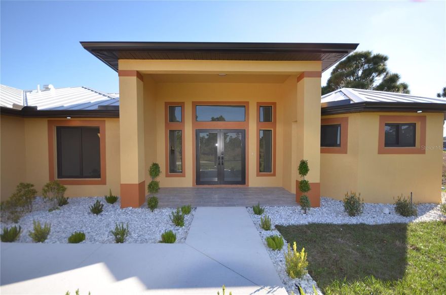 Discover your dream home in the heart of Lehigh Acres, FL! This stunning 2,601 square foot residence, built in 2025, offers a perfect blend of modern design and comfort. With three spacious bedrooms and 2.5 luxurious bathrooms, there is ample room to accommodate your lifestyle. The open-concept layout allows for seamless flow between the living areas, making it ideal for entertaining or simply enjoying a quiet evening at home.

The gourmet kitchen is a chef's delight, featuring a sleek stove, microwave, refrigerator, and dishwasher, ensuring that meal preparation is a breeze. Enjoy the convenience of washer and dryer hookups, making laundry days effortless. The central air conditioning system promises year-round comfort, while the attached garage provides secure parking and extra storage space. This home is designed with your needs in mind, offering both functionality and style.