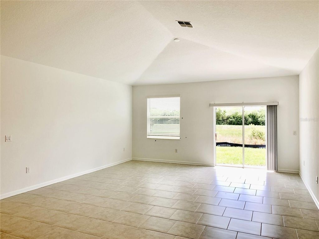 Photo of 125 Pineywoods Street, Saint Cloud, FL 34772 (MLS # O6363186)