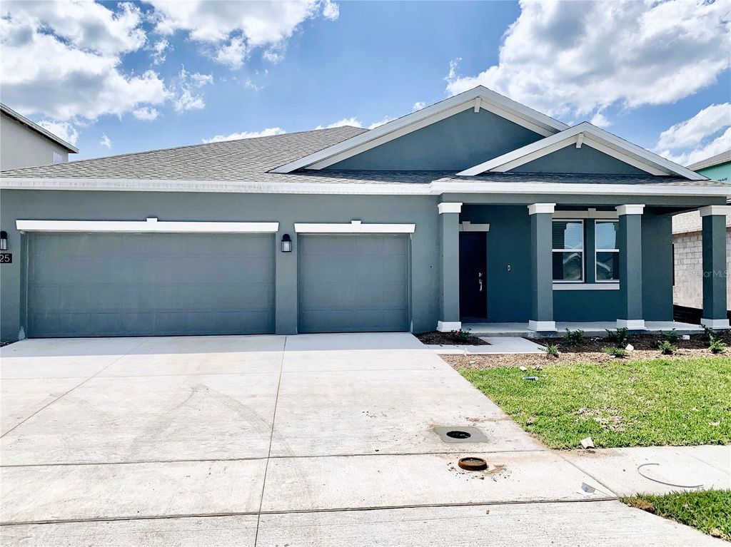 Photo of 125 Pineywoods Street, Saint Cloud, FL 34772 (MLS # O6363186)