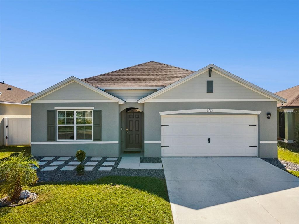 Photo of 3712 Diving Dove Lane, Bartow, FL 33830 (MLS # O6353120)