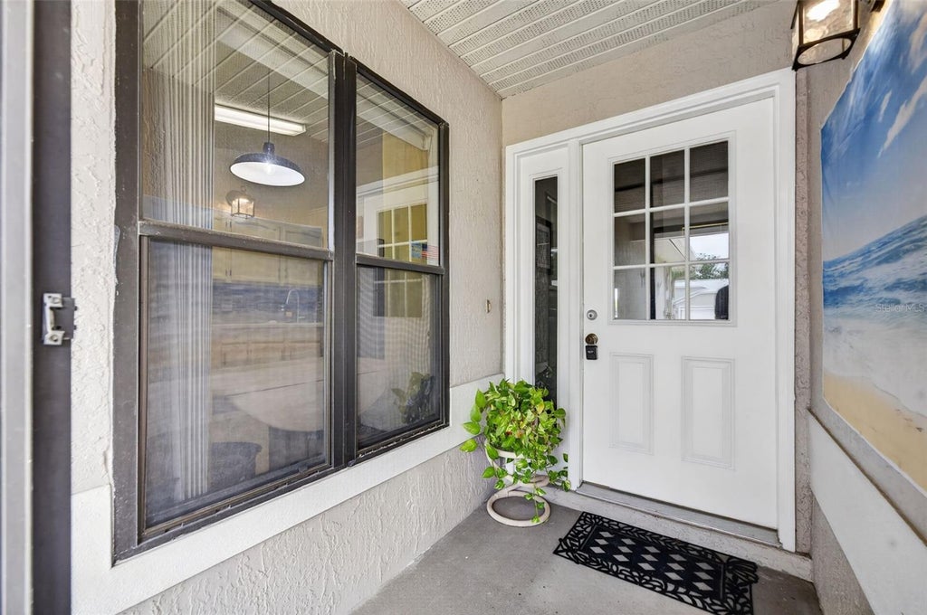 Photo of 6381 Egret Drive #28, Lakeland, FL 33809 (MLS # O6429079)
