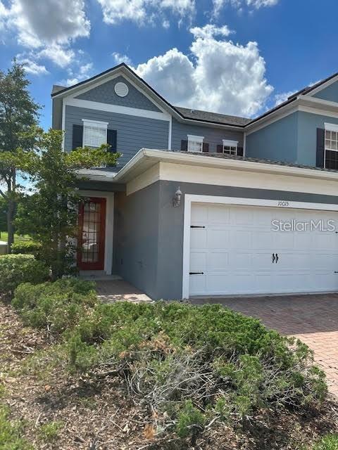 Photo of 10015 Moorshire Circle, Orlando, FL 32829 (MLS # O6438401)