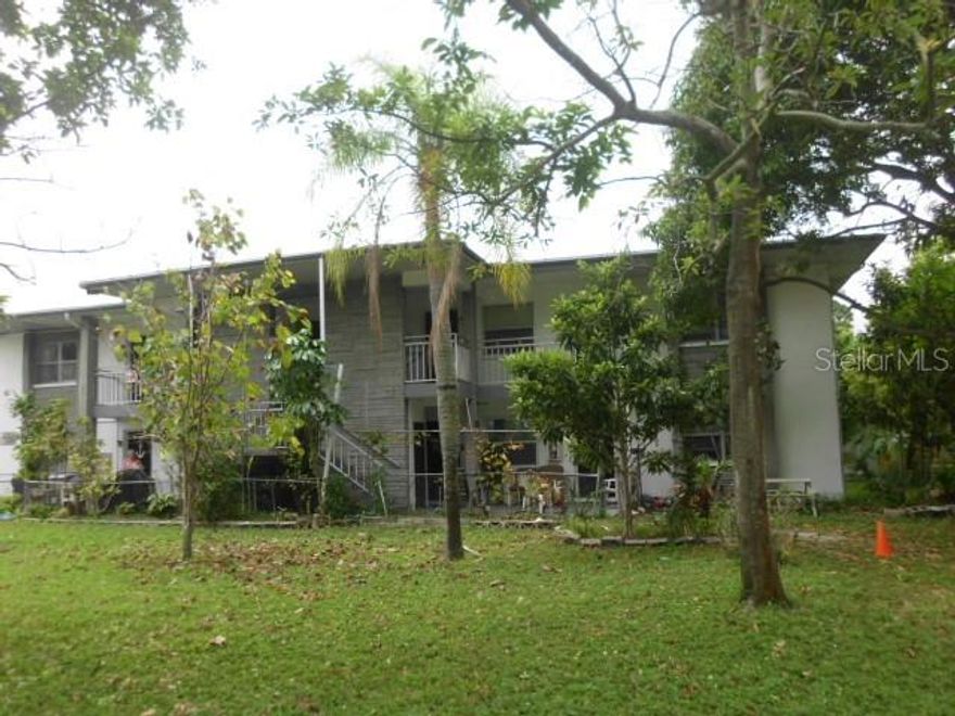 The block construction building is 2 story and consists of 12 apartments. Build in 1973. All units have assigned parking. One of the tenants reside there over 30 years. Location is important factor. It is close to 4th street N with great stores, banks and service businesses. Getting to Tampa is very convenient as well as to downtown St Petersburg (new pier) with museums, restaurants and marina. Apartments have central air conditioner and heat accept studio has wall unit. Front yard has big mango tree. This property is nice to live in owner.