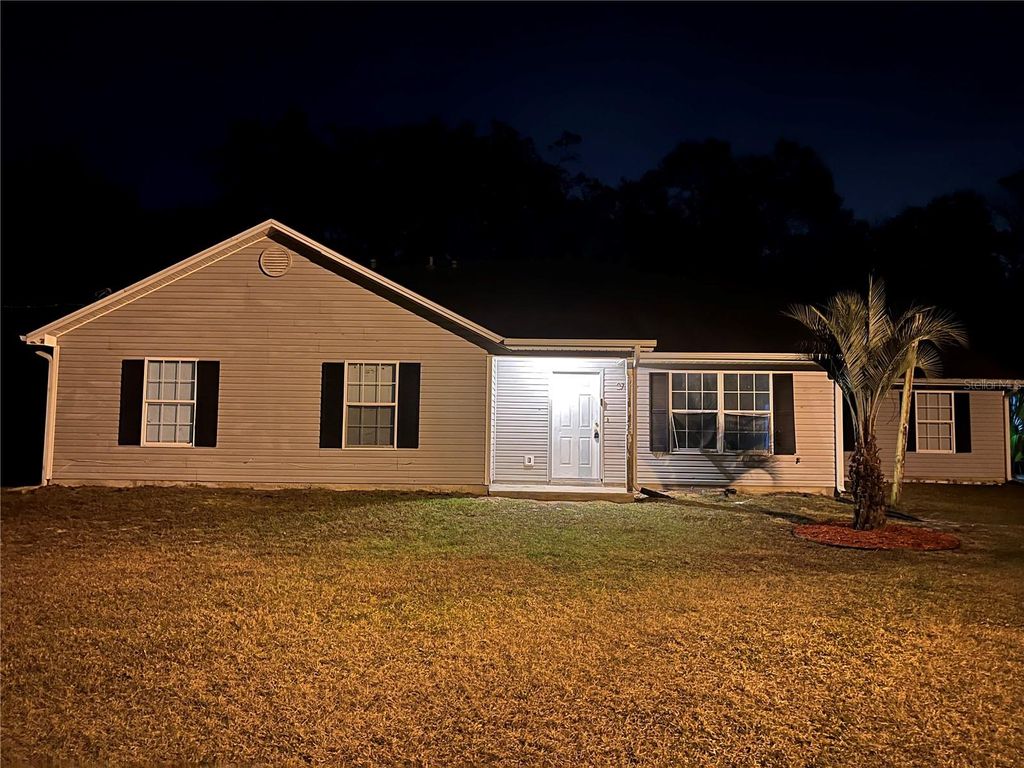 Photo of 27751 Virgil Hawkins Circle, Okahumpka, FL 34762 (MLS # TB8470538)
