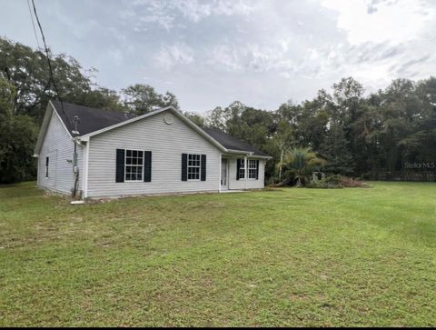Photo of 27751 Virgil Hawkins Circle, Okahumpka, FL 34762 (MLS # TB8470538)