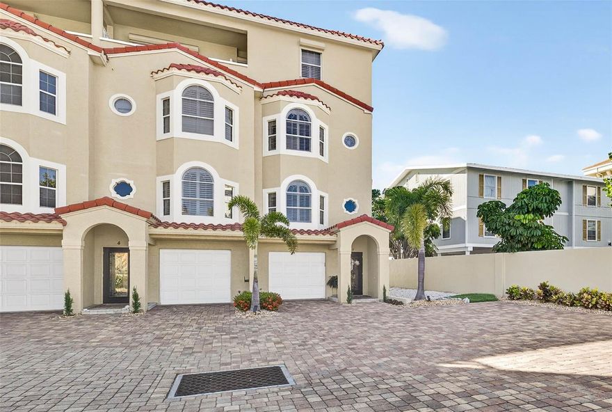 TURN KEY TOWNHOME on Pass A Grille Channel!  This home is move in ready so that you can enjoy all the amenities of Tierra Verde & St Pete Beach lifestyle!! Gorgeous touches everywhere!  Home has so many updates, you will need to contact me for the list!!  But to list a few....All new VPLK flooring, New quartz kitchen & bathroom countertops, kitchen backsplash, New light fixtures, new toilets, mirrors, faucets.  All switchplates & outlet covers replaced, all new bathroom hardware.  All cabinets, trim, doors, walls & ceilings were painted and new hardware was added.  New water heater(10/25), new garage door opener, new smoke & carbon monoxide detectors were added.  This home has 3 outside areas to enjoy all hours of the day!  Look at the pictures for beautiful sunsets over Pass A Grille Beach.  Hurricane shutters all three levels and new hurricane slider -garage level.  This home has attached shelving in the garage plus a nook for storage.  3 cars can fit easily!! Not to mention, there is a deeded 15,000lb boat lift!!!! The community is very private w/7 units and a saltwater pool & hot tub.  There is an fire pit as well.   You can live the lifestyle...go to the beach - Beautiful Ft DeSoto, Pass A Grille Beach, or hop in your boat and go to many of the local spots~Bunces Pass & Shell Key! Downtown St Petersburg is 20 minutes away for amazing lunch or dinner.  Go to the many festivals & take a stroll at the Pier that are St Pete's charm.  Do not miss this beautiful home! !