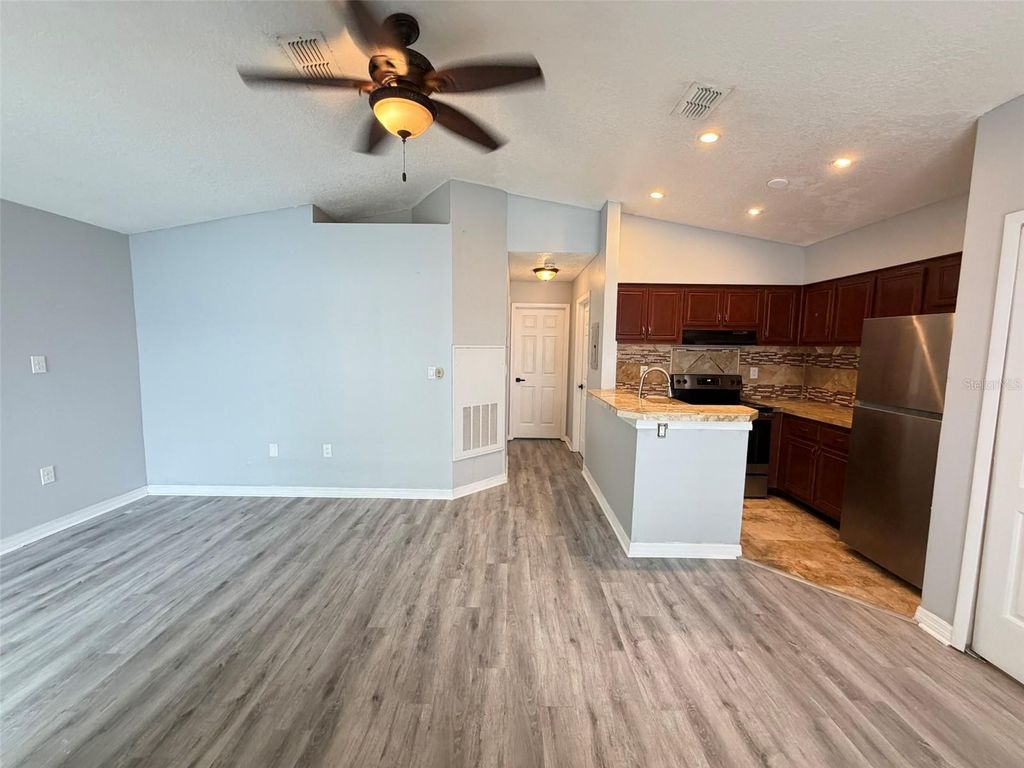 Photo of 942 Loquat Tree Road, Orlando, FL 32811 (MLS # O6398161)