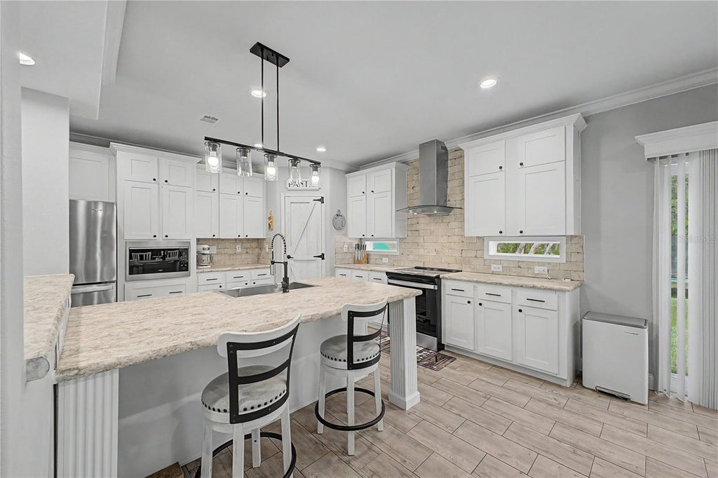 Photo of 11293 Cleever Street, Weeki Wachee, FL 34614 (MLS # W7888290)