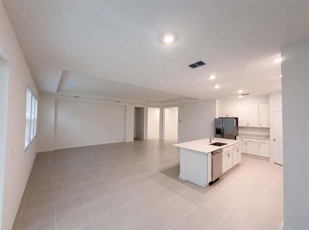 Photo of 669 Tundra Loop, Groveland, FL 34736 (MLS # O6433994)