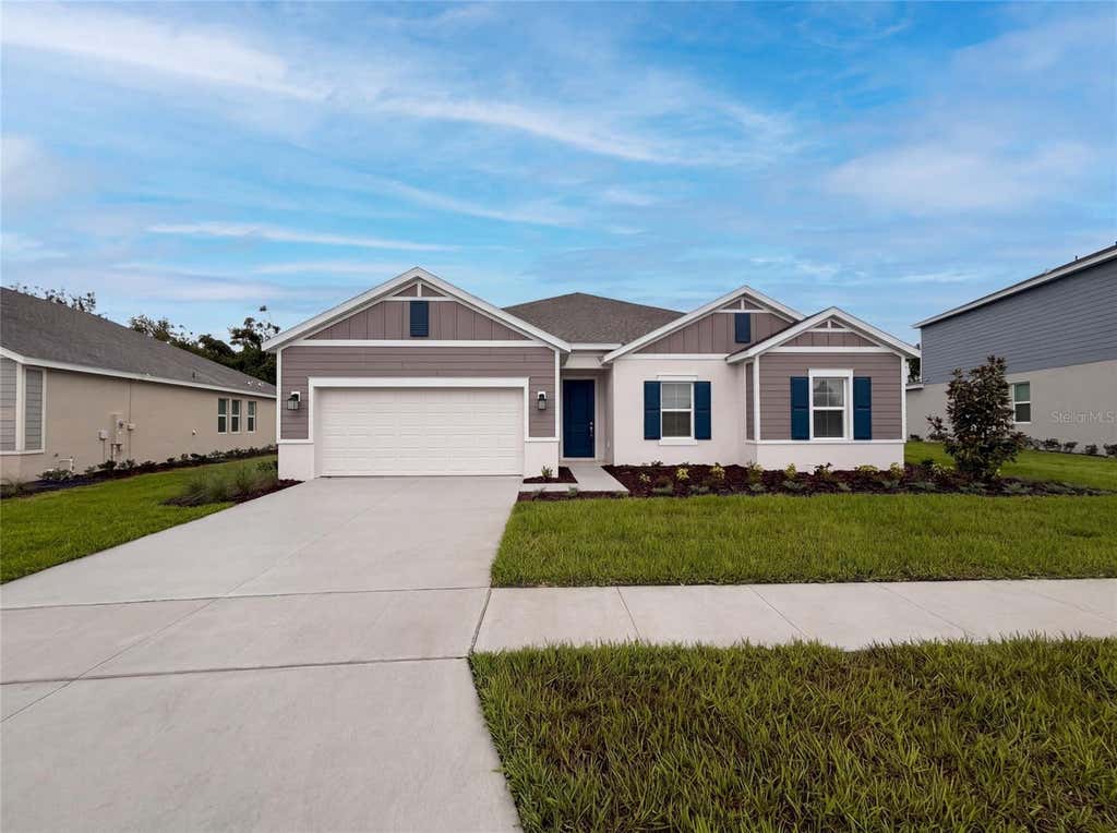 Photo of 669 Tundra Loop, Groveland, FL 34736 (MLS # O6433994)