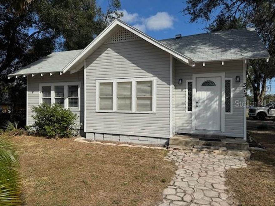 Welcome to your dream home in Groveland! This beautifully renovated 3-bedroom, 2-bathroom house combines rustic charm with modern elegance, offering over 1,600 square feet of thoughtfully designed living space. Situated in a great neighborhood, this home provides the perfect balance of comfort, style, and convenience. The kitchen is a chef’s delight, featuring brand-new appliances, sleek quartz countertops, and stylish new cabinetry, making it ideal for cooking and entertaining. The spacious layout includes a versatile bonus room that can serve as a third bedroom, home office, or personal gym. The guest bathroom has been tastefully remodeled with elegant finishes, while newly installed, durable flooring throughout the home adds a polished and inviting touch. Freshly painted inside and out in modern, neutral tones, this home offers a warm and timeless ambiance. Located in a family-friendly community, this property is just a short walk from the local middle school, making it perfect for large families. Oversized lot provides ample space for kids and pets to play. Its proximity to downtown Groveland means you’re only minutes away from charming shops, restaurants, and community events, all while enjoying the peace and tranquility of a welcoming neighborhood. This move-in-ready home is an exceptional opportunity to enjoy the best of Groveland living. Combining modern updates with timeless character, it’s a place you’ll love to call home.