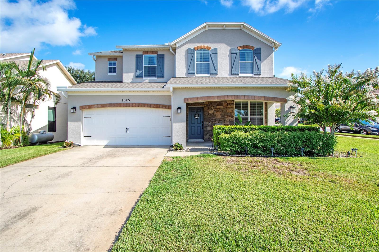 Welcome to your spacious Minneola retreat! This 4-bedroom, 2.5-bath, 2-story home with 2,866 sq. ft. offers modern living in one of Central Florida’s fastest-growing communities. Step inside to find luxury vinyl plank flooring throughout the downstairs, with expansive open concept living areas. A den/office at the entry makes working from home easy, while the open-concept kitchen shines with granite countertops, a large island, and walk-in pantry. The primary suite is a true escape—plenty of room for a sitting area plus an oversized walk-in closet and ensuite with oversized shower and dual sink vanity. Upstairs bedrooms provide generous space, and the homes layout is designed for both entertaining and everyday comfort. Out back, enjoy a low-maintenance fenced corner lot with artificial turf, a large paver patio, and plenty of room to gather. Just a 3-minute walk takes you to the community’s two resort-style pools, an 8-minute walk to the Minneola Athletic Complex which has tennis, basketball, baseball, soccer and football fields plus Publix, Starbucks, Chipotle and more are right outside the neighborhood for everyday convenience. With easy access to the Florida Turnpike, you’re close to it all—and soon, the upcoming Hills City Center will bring exciting new dining, shopping, and even a Crooked Can Brewery just minutes away. Don’t miss this opportunity to live in sought-after Minneola with space, style, and convenience all in one.