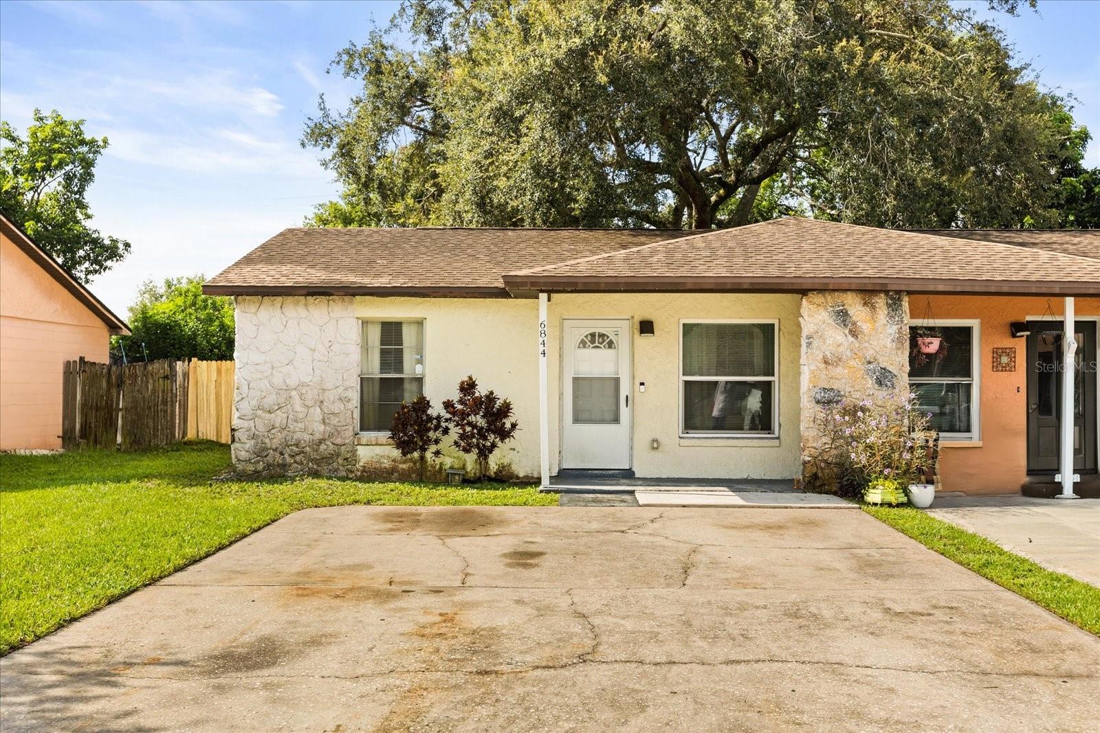 This charming duplex is more than just a property it features 2 bedrooms, 1 bathroom plus a bonus room perfect for playroom or office. From the moment of entry you will feel the comforts of home and much more. Spacious fenced backyard is perfect for relaxing, entertaining or enjoying an evening outdoors. Property has newer roof. This home is located near the airport, world famous Disney Parks as well as nearby schools, shopping and restaurants! No HOA! Home is also perfect for investors. Call for a private tour today!