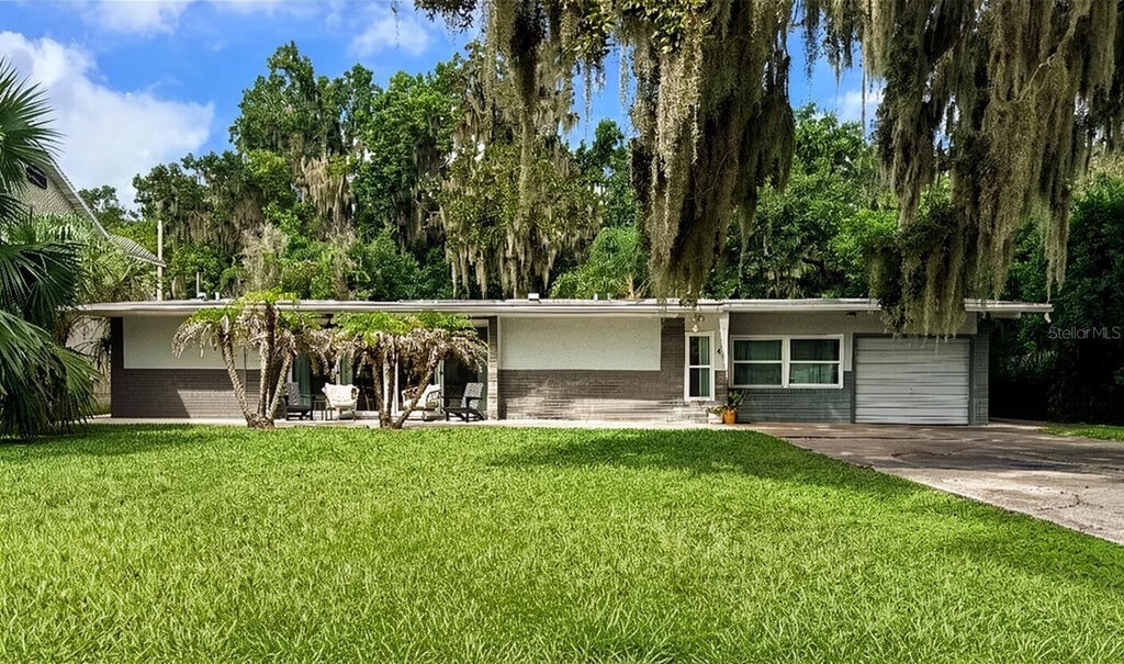Photo of 46 Palm Drive, Yalaha, FL 34797 (MLS # O6433995)