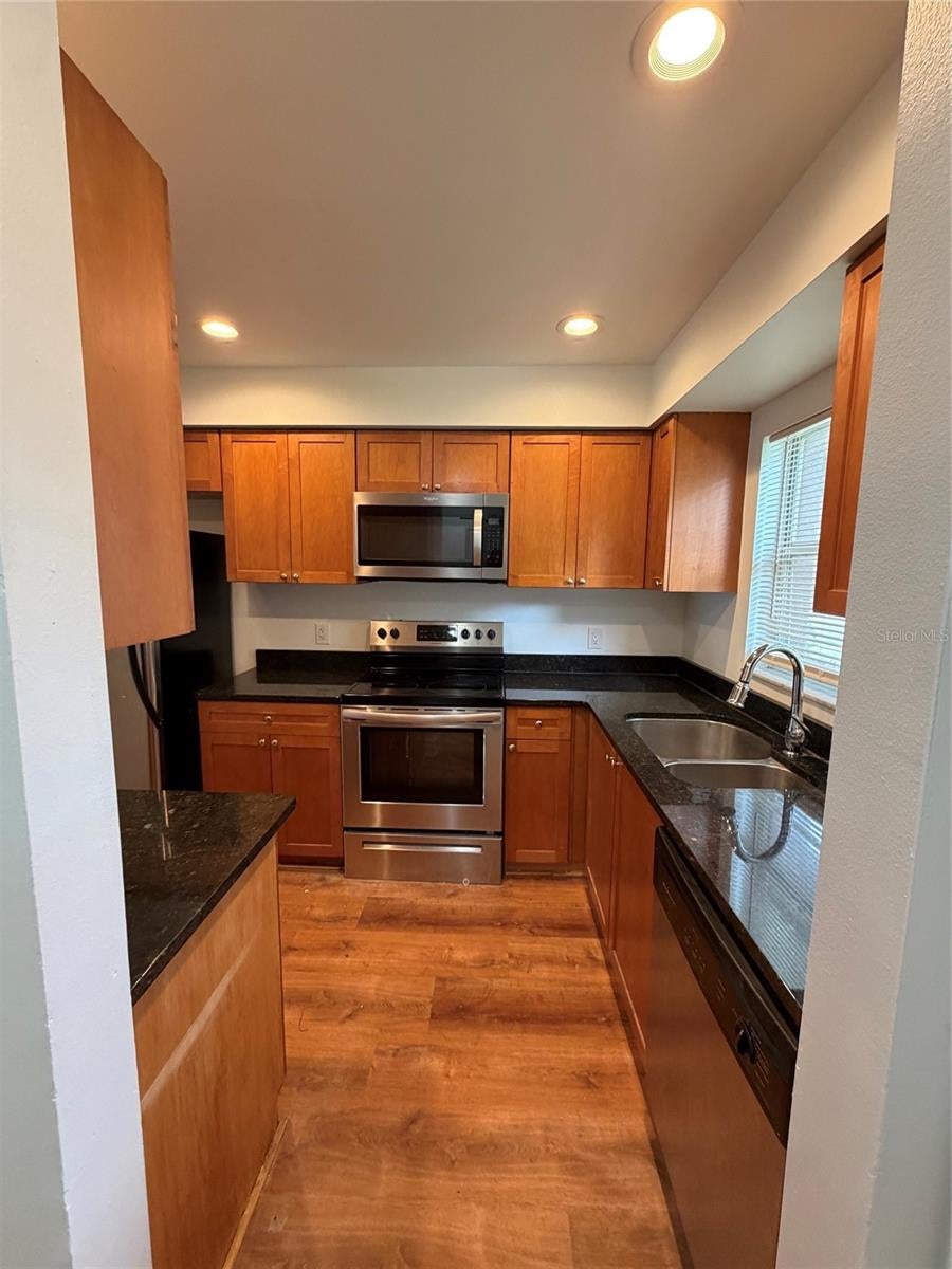 Photo of 5420 E Michigan Street #5420-4, Orlando, FL 32812 (MLS # O6446926)