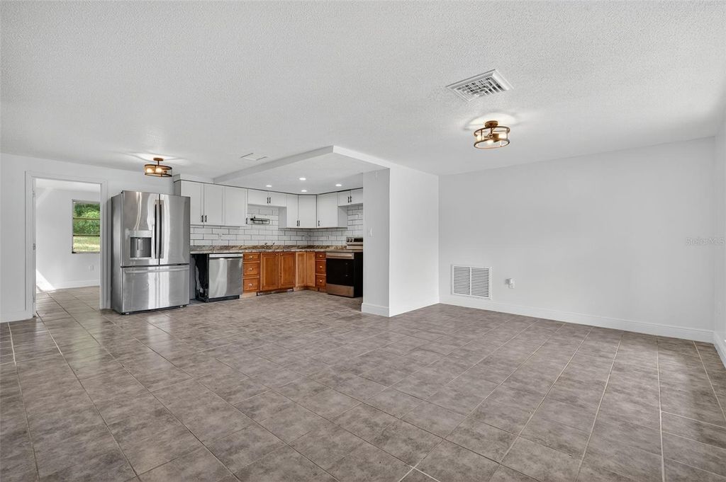 Photo of 12111 Camp Creek Lane, Hudson, FL 34667 (MLS # TB8434661)