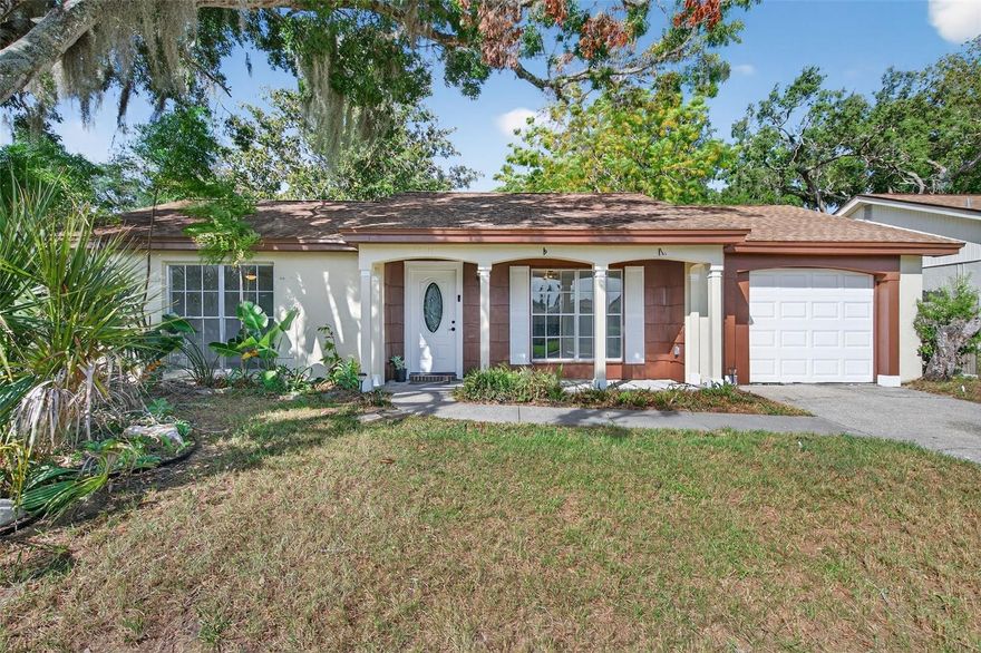 FHA and VA offers welcome!  Affordable 3-bedroom, 2 bath home located in the desirable Beacon Woods community.  Community pool and amazing amenities for a LOW monthly HOA of only $21.25 per month, paid quarterly. This move-in-ready home features a spacious open floor plan with tile flooring throughout the home. The kitchen offers a functional layout, Stainless Steel appliances, and connects seamlessly to the main living spaces, perfect for everyday living and entertaining.  Located on a a Cul-De-Sac road, enjoy peace and privacy. AC installed in 2020 and the dimensional shingle roof in 2011. All bedrooms are generously sized with ample closet space. The home includes a one-car garage and sits on a nicely sized lot with mature trees.  Residents of Beacon Woods enjoy access to a clubhouse, heated community pool, tennis and basketball courts, racquetball, shuffleboard, and picnic areas. Conveniently located near shopping, dining, medical facilities, and just a short drive to the Gulf beaches. Save money on insurance, the home is located in Flood Zone X. Please note:  The garage bathroom only has a shower and toilet, no sink.  All of the information is believed to be accurate and should be verified by the buyer(s). Schedule your private showing today and experience all that this inviting Hudson home and community have to offer.