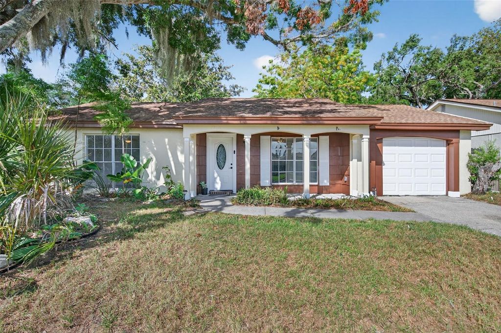 Photo of 12111 Camp Creek Lane, Hudson, FL 34667 (MLS # TB8434661)
