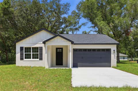 Photo of 14316 27th Ct, Summerfield, FL 34491 (MLS # O6429782)