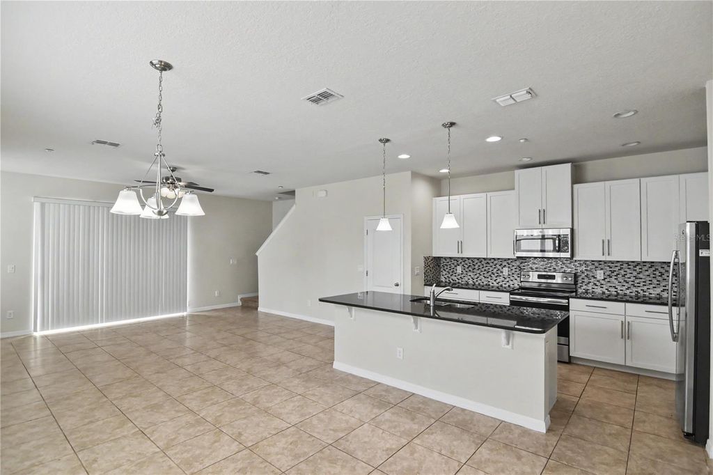 Photo of 7485 Aloma Pines Ct, Winter Park, FL 32792 (MLS # O6398259)