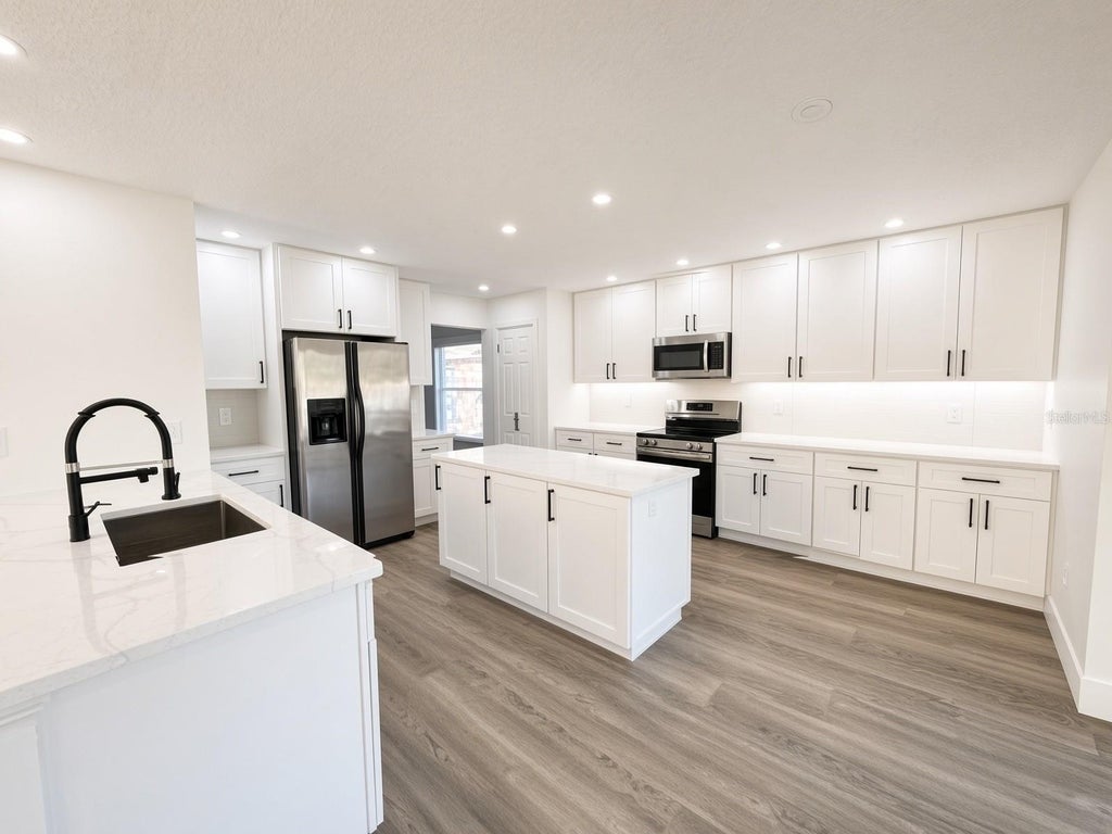 Photo of 1959 Westpointe Circle, Orlando, FL 32835 (MLS # O6450413)