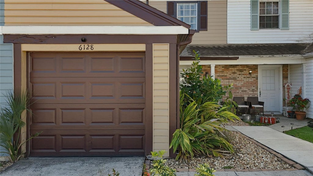Photo of 6128 Oak Cluster Circle, Tampa, FL 33634 (MLS # TB8549117)