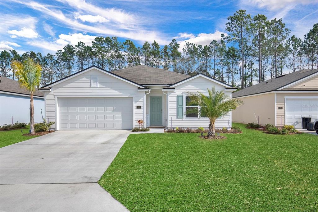 Photo of 100 Hulett Woods Road S, Palm Coast, FL 32137 (MLS # FC315915)